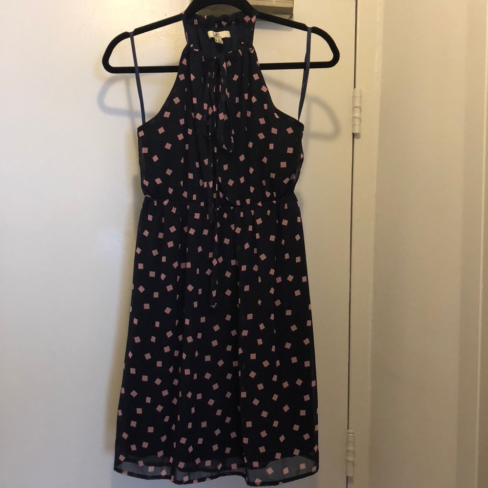 Blue dress with pink square shapes